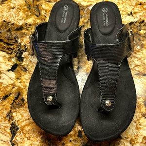Black sandals with silver buckle